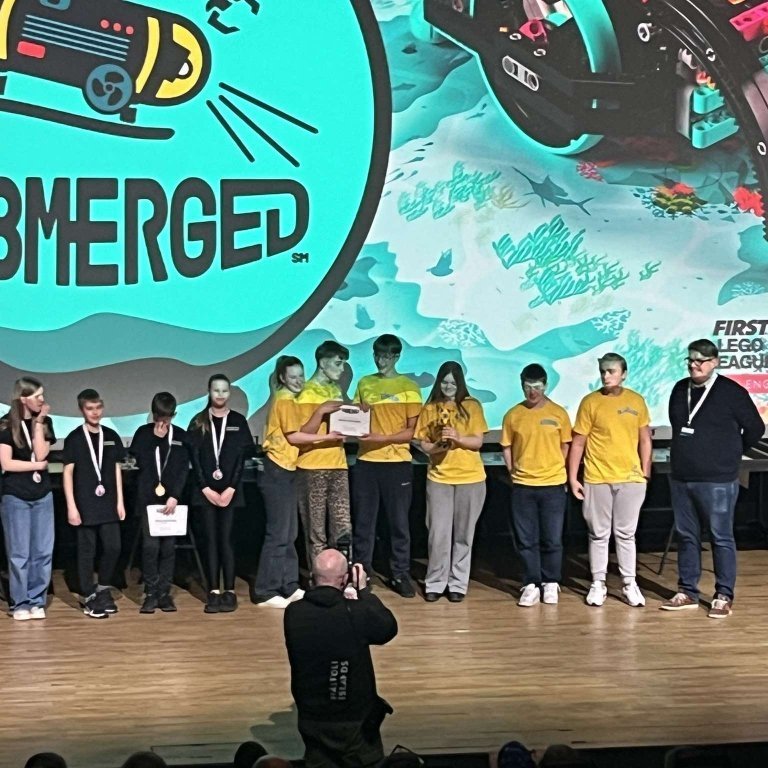 Liðið 701 að taka á móti verðlaunum - Besta liðsheildin.